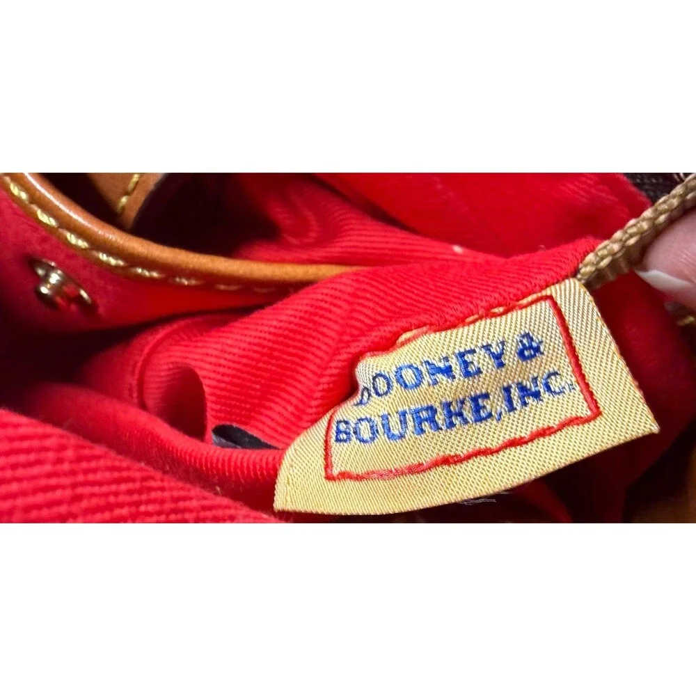 Genuine Dooney and Bourke Zip Crossbody Bag in Hot Pink MSRP $218.00 like new